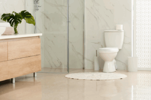 Beautiful modern bathroom with a glass shower and porcelain toilet