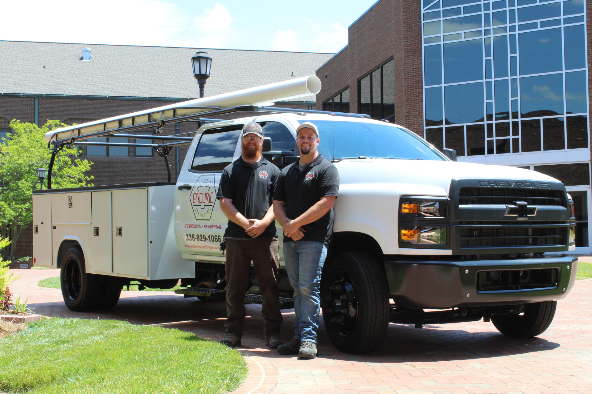 Enduric Plumbing team infront truck providing residential and commercial plumbing services in Winston, Salem