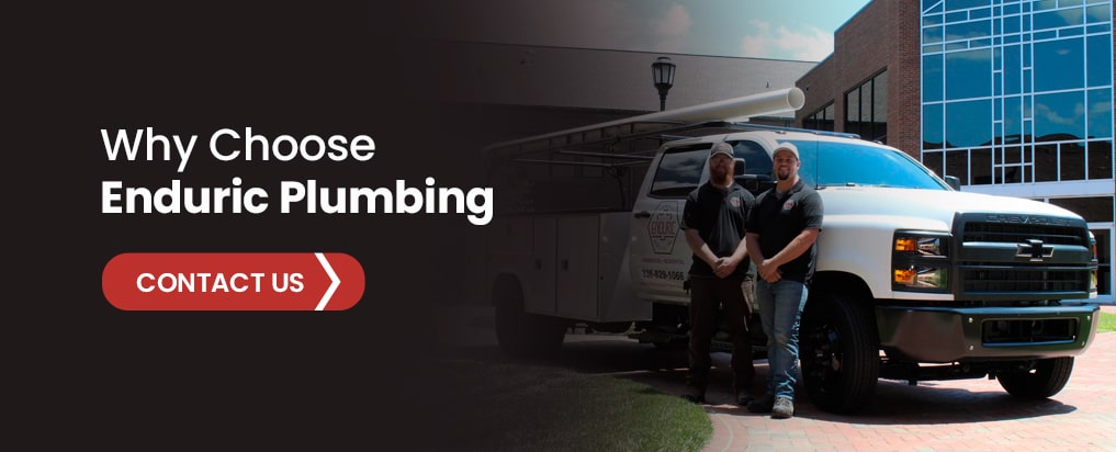 Enduric Plumbing plumbers standing next to van ready to work